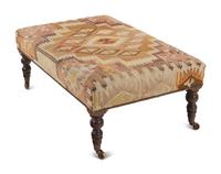 A Kilim Upholstered Ottoman