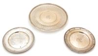 Three American Silver Plates, Unknown Maker, one having a reticulated border and reeded edge, together with two smaller plates, all mon