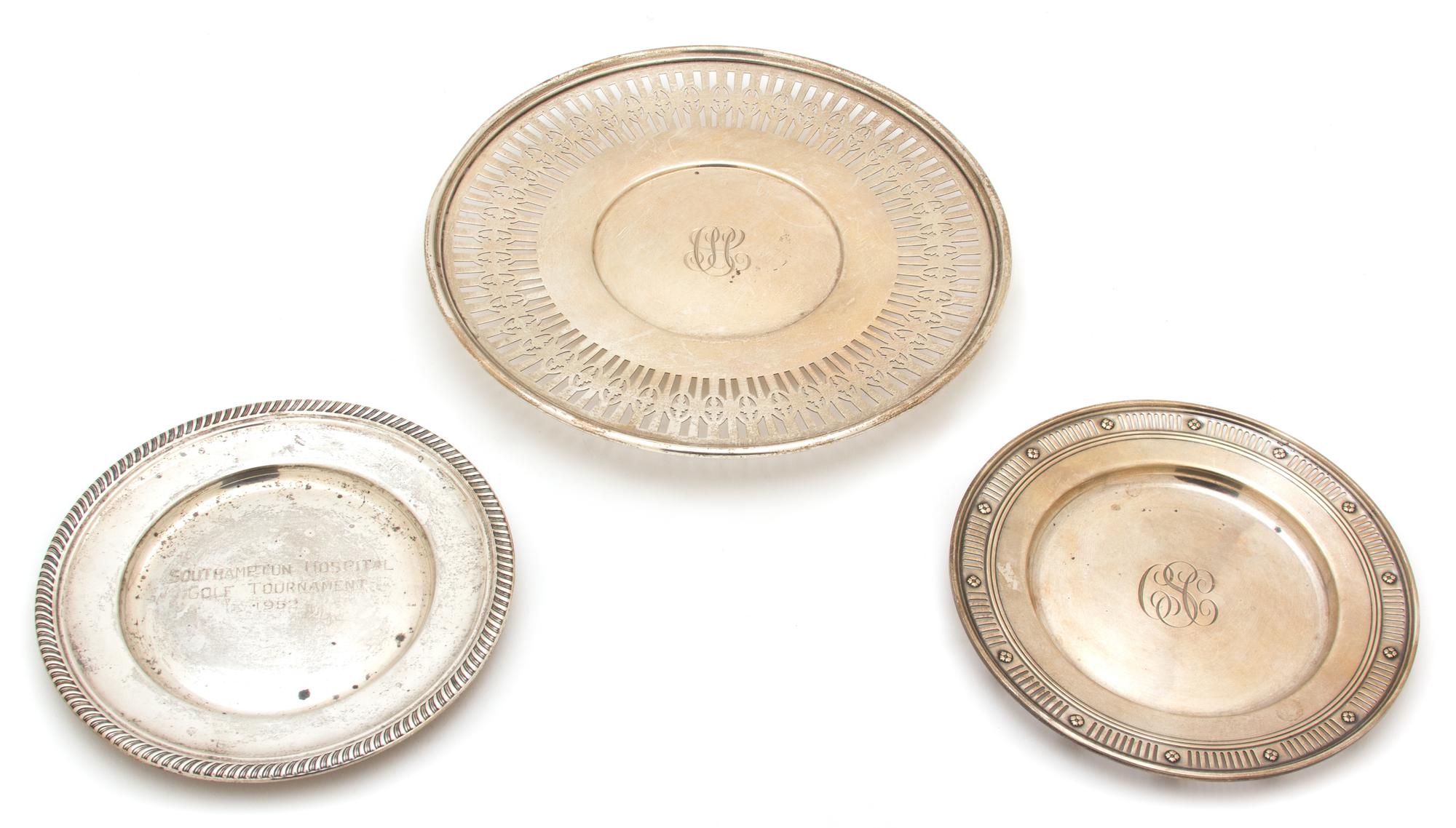 Three American Silver Plates, Unknown Maker, one having a reticulated border and reeded edge, together with two smaller plates, all mon
