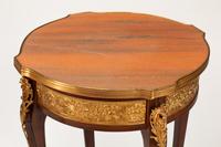 A Pair of Louis XV Style Gilt Bronze and Gilt Metal Mounted Marble-Top Gueridons