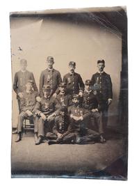 [AFRICAN AMERICANA - EARLY PHOTOGRAPHY]. CDV-sized tintype of a group of men in uniform, incl. African American subject.