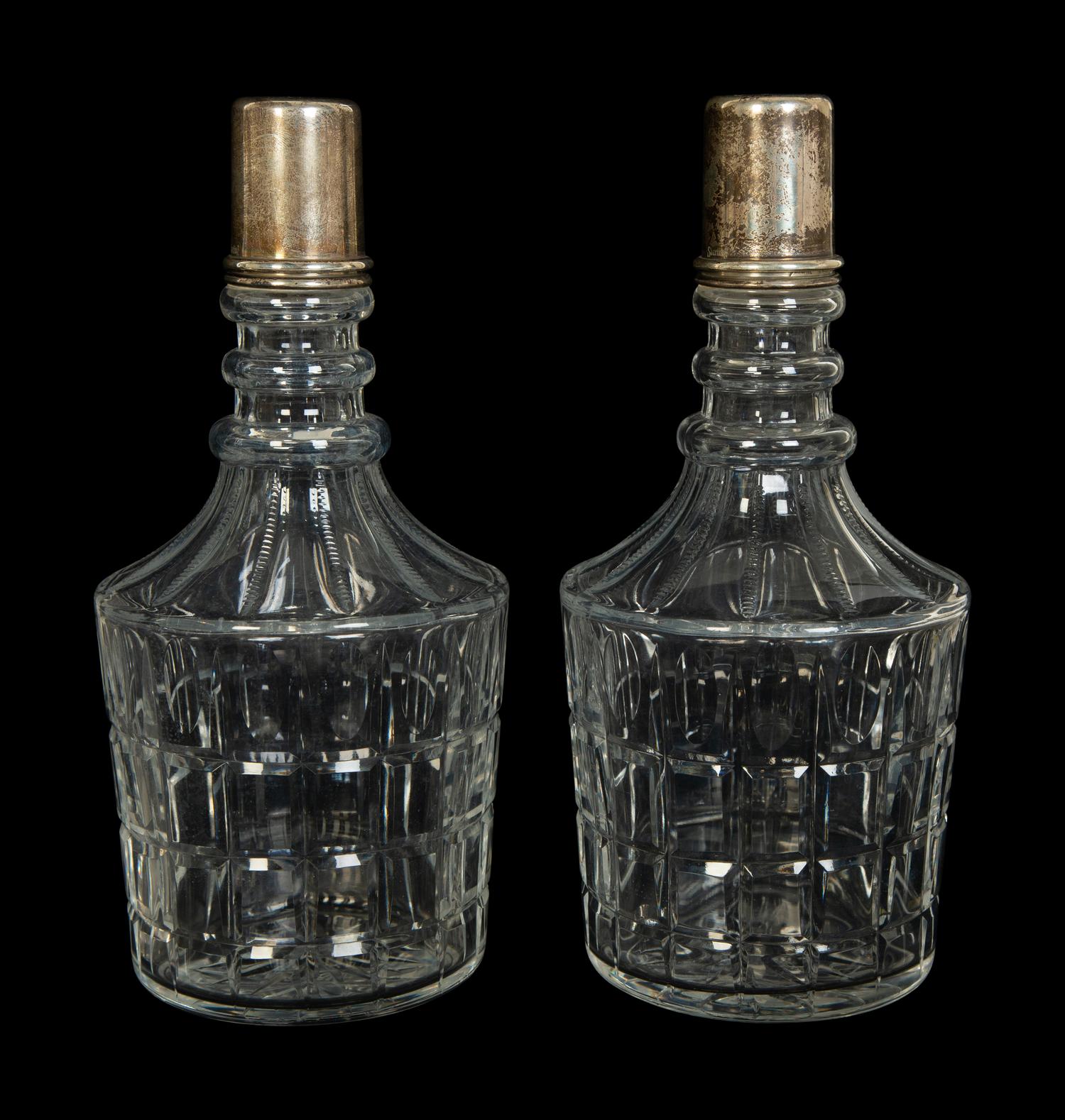 Four American Silver Mounted Cut Glass Decanters