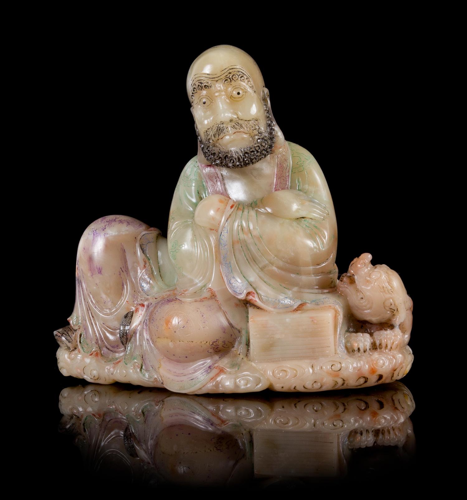 A Soapstone Figure of a Luohan Height 4 1/2 inches.