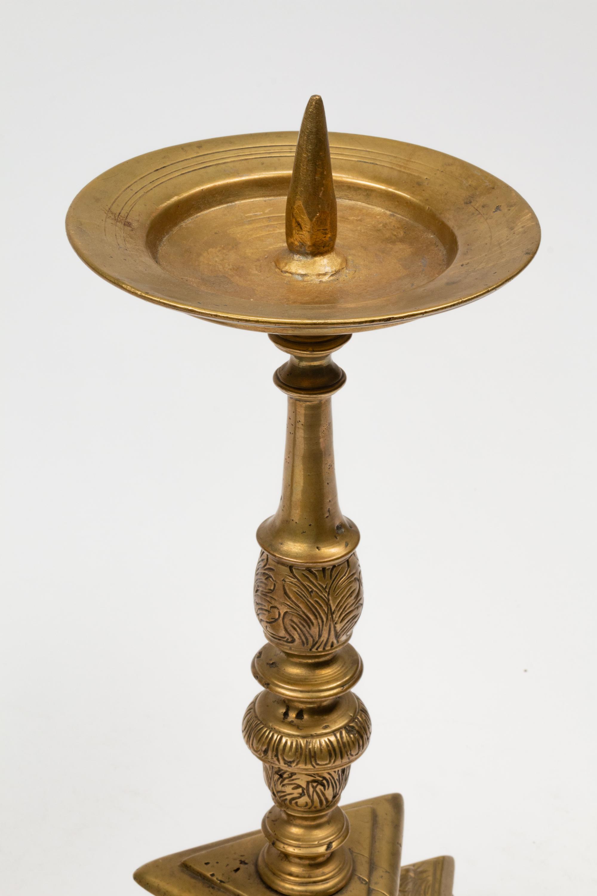 A Pair of Dutch Brass Candlesticks