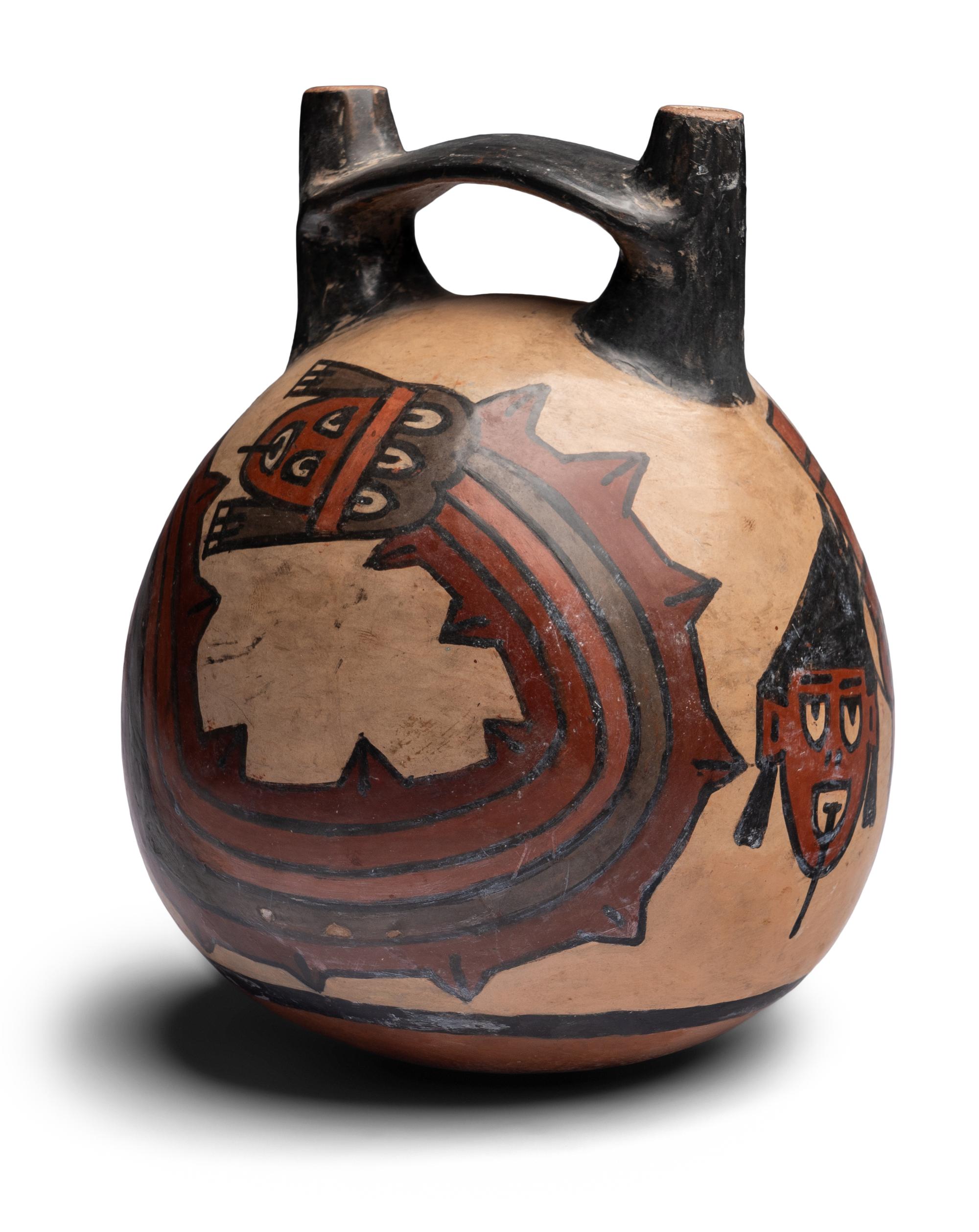 A Nazca Style Polychrome Stirrup Vessel