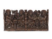 A Spanish Colonial Walnut Frieze Depicting the Four Evangelists