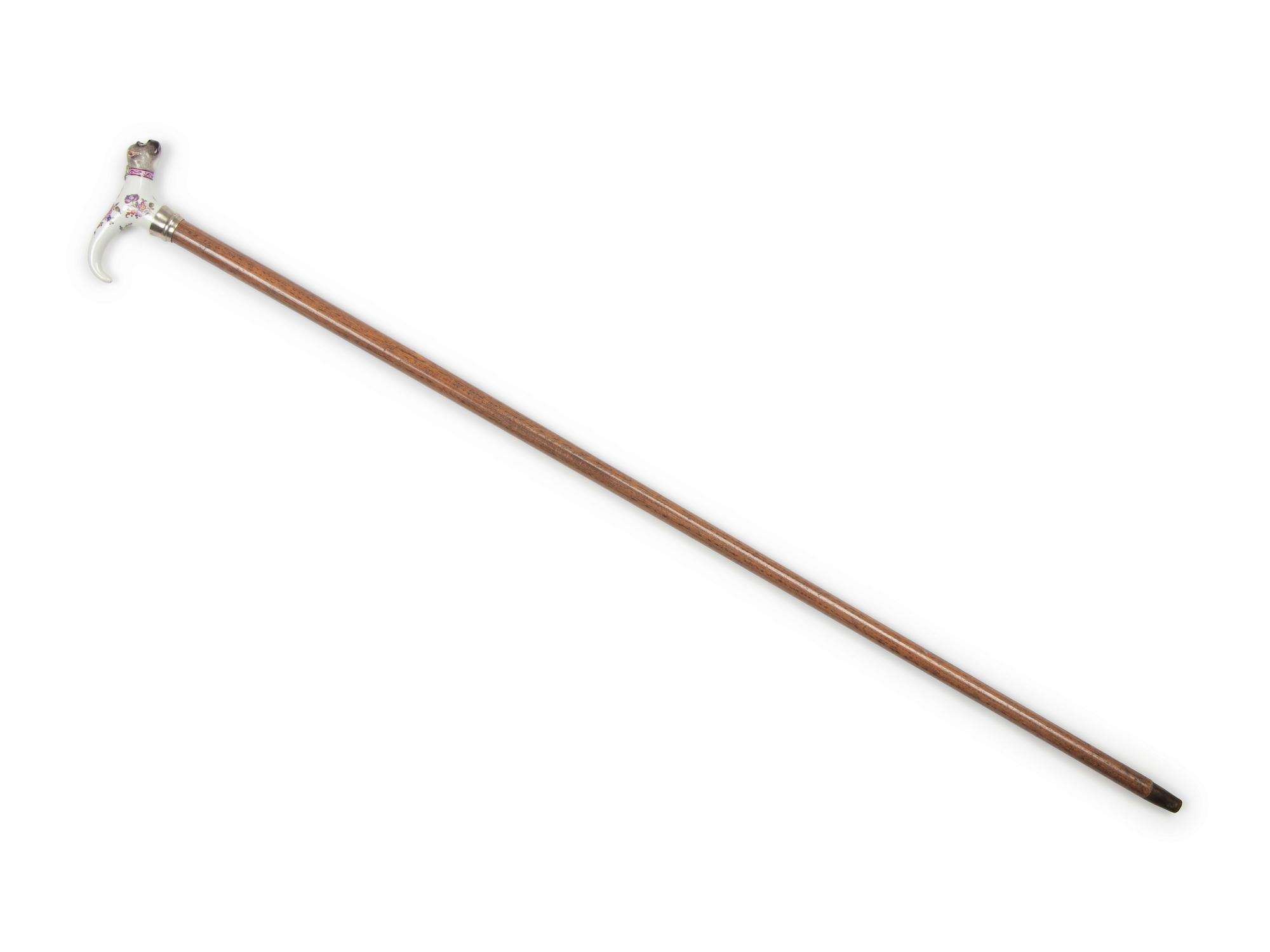 A German Porcelain and Silvered Metal Mounted Walking Stick