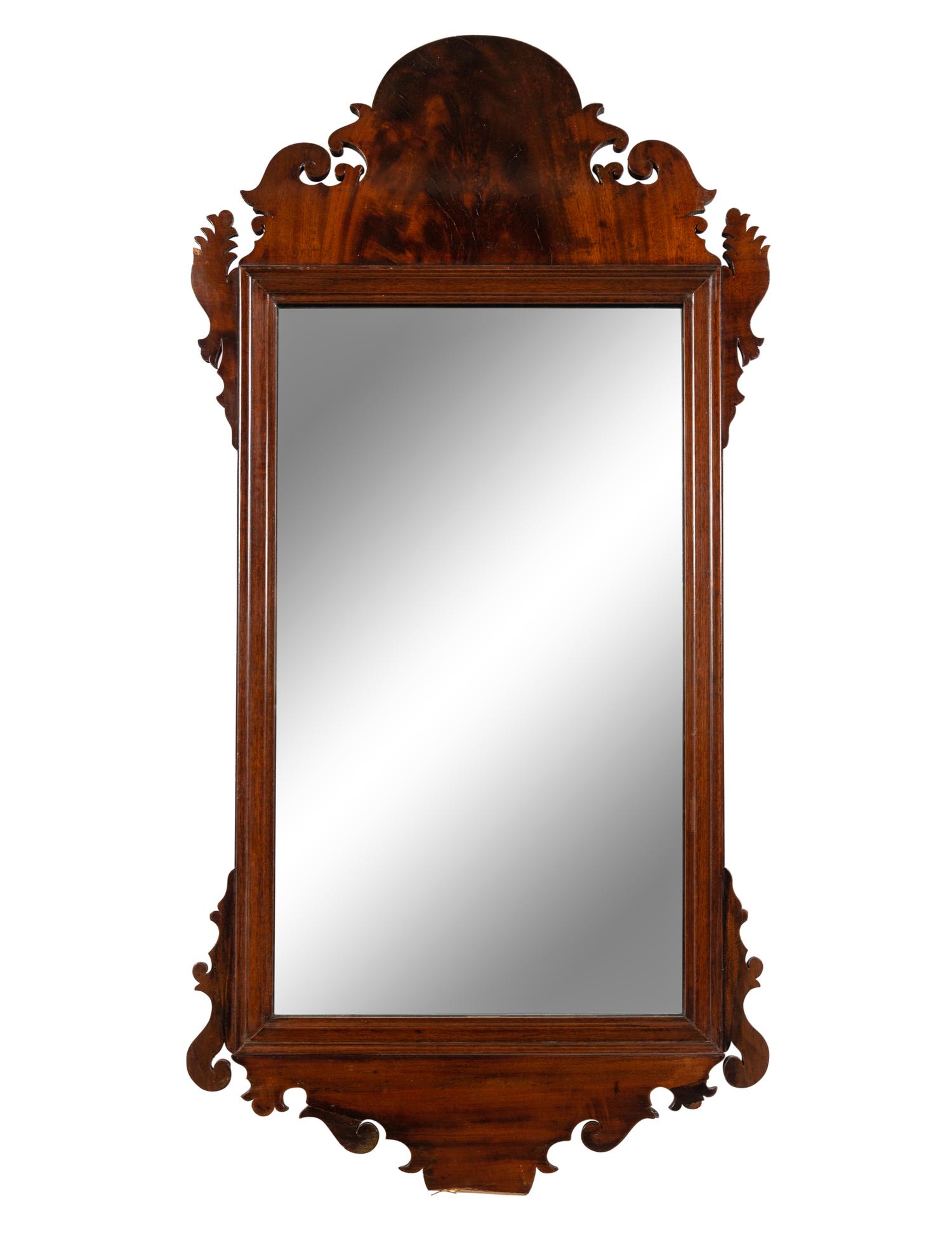 A Chippendale Carved and Figured Walnut Looking Glass