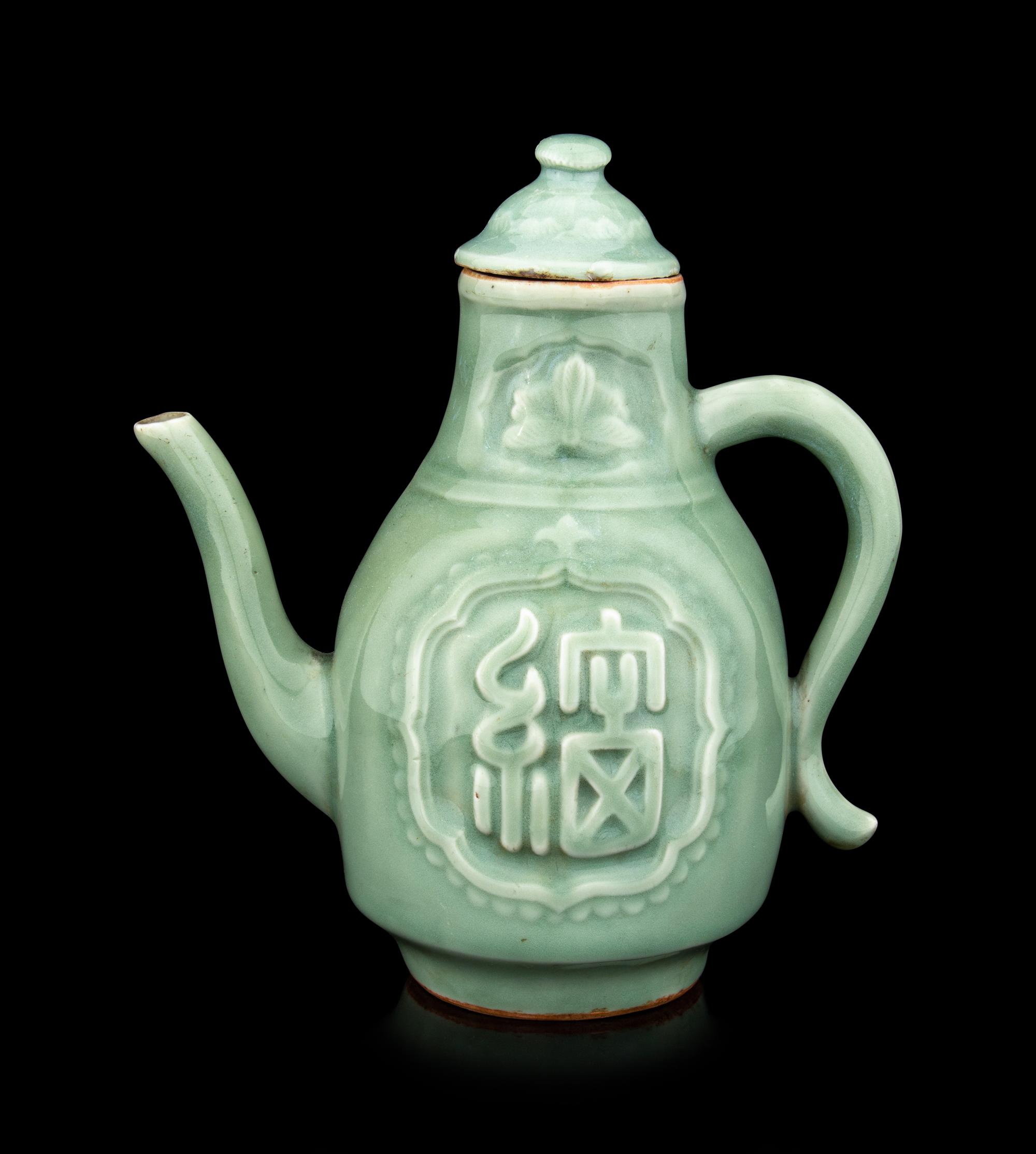 A Longquan Celadon Glazed Porcelain 'Longevity' Teapot