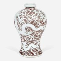 A Chinese carved and underglaze red "Dragons and Waves" vase, Meiping Yongzheng six-character mark and of the period