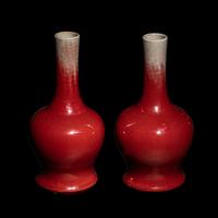 A Pair of Chinese Sang-de-Boeuf Glazed Porcelain Bottle Vases