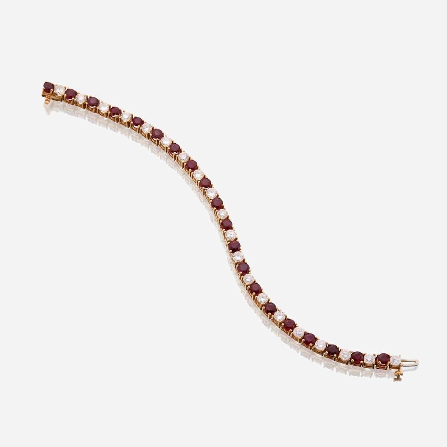 A diamond, ruby, and fourteen karat gold bracelet