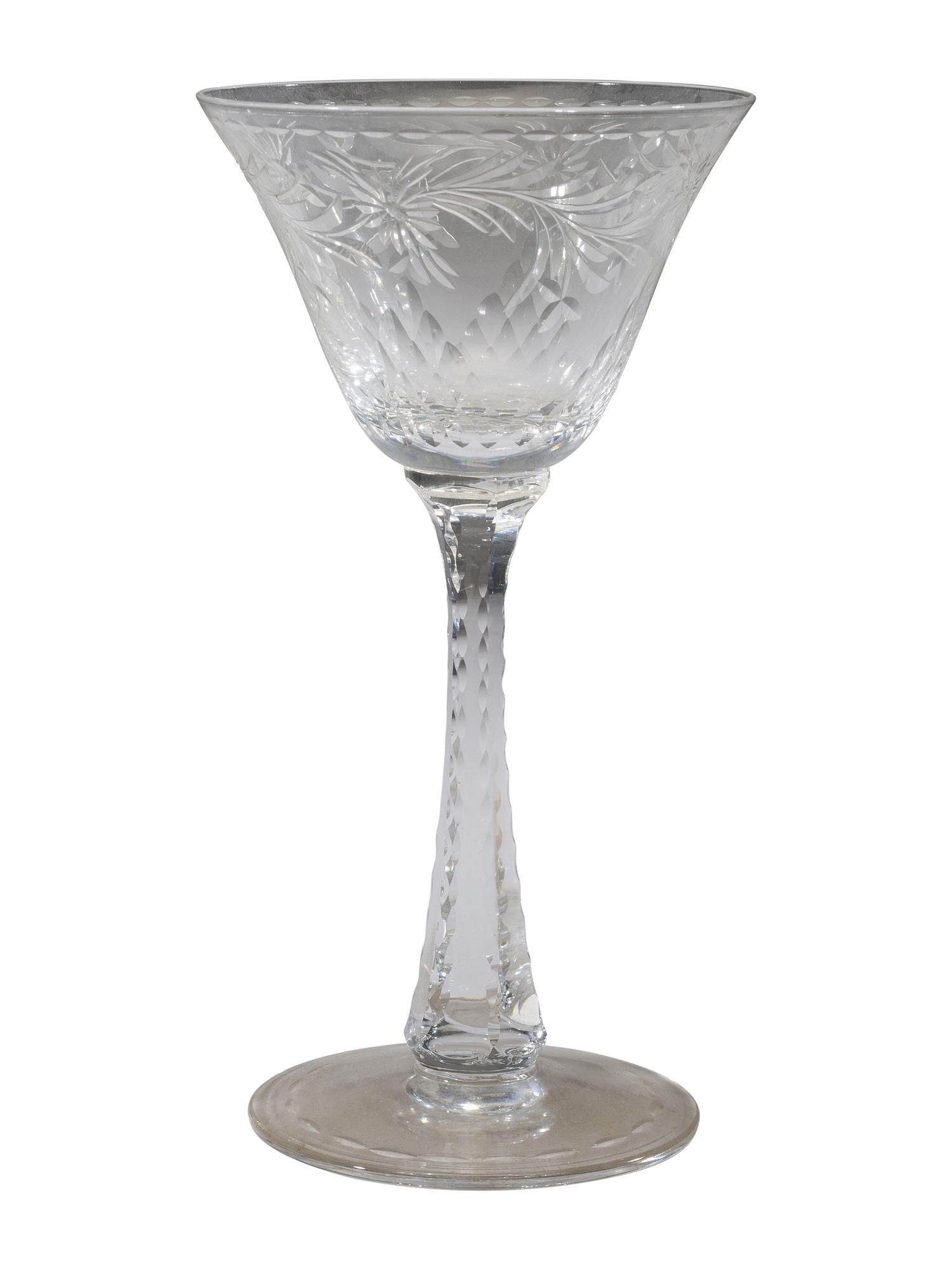 A Collection of Cut Glass Stemware and Plates