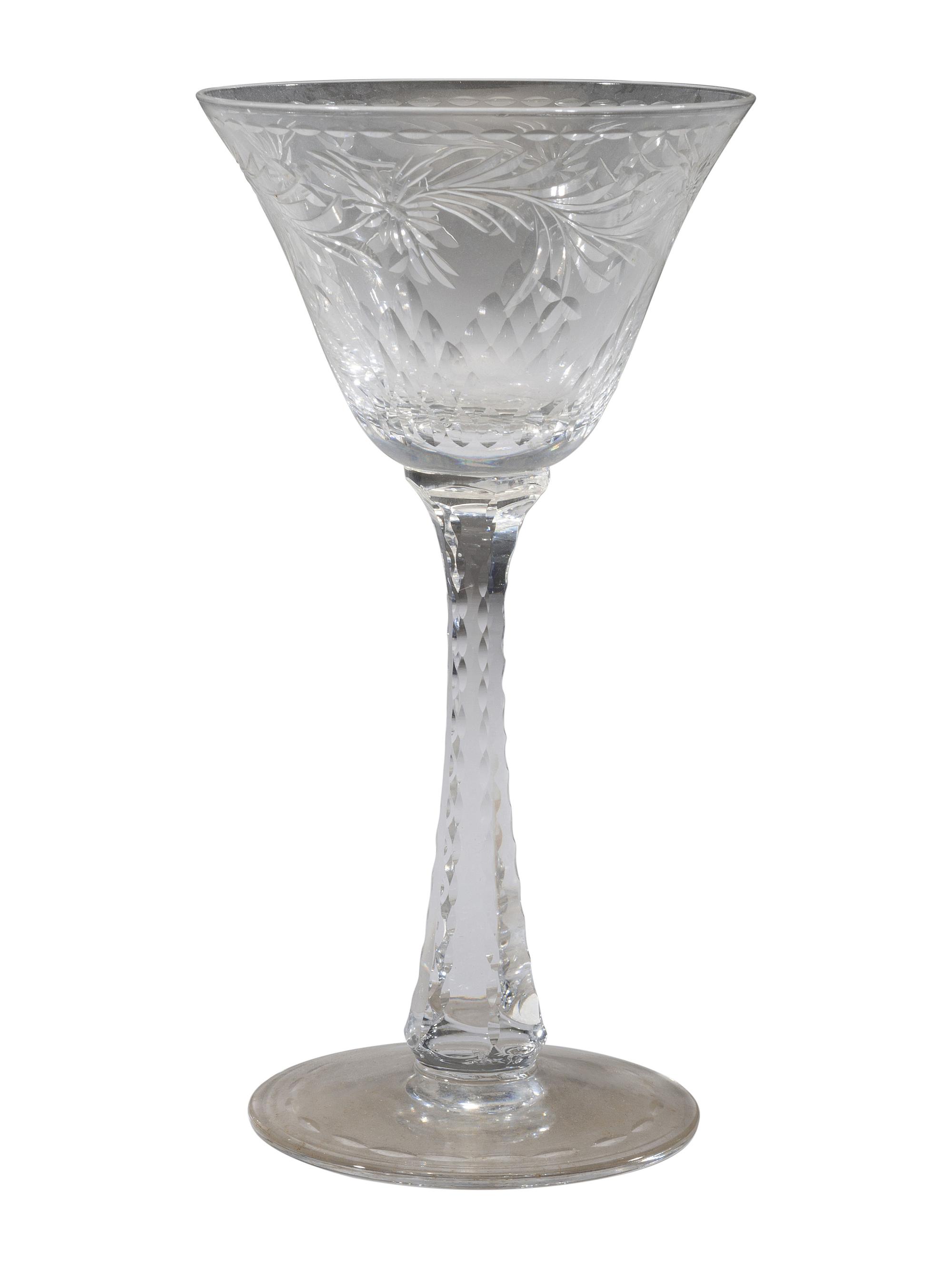 A Collection of Cut Glass Stemware and Plates