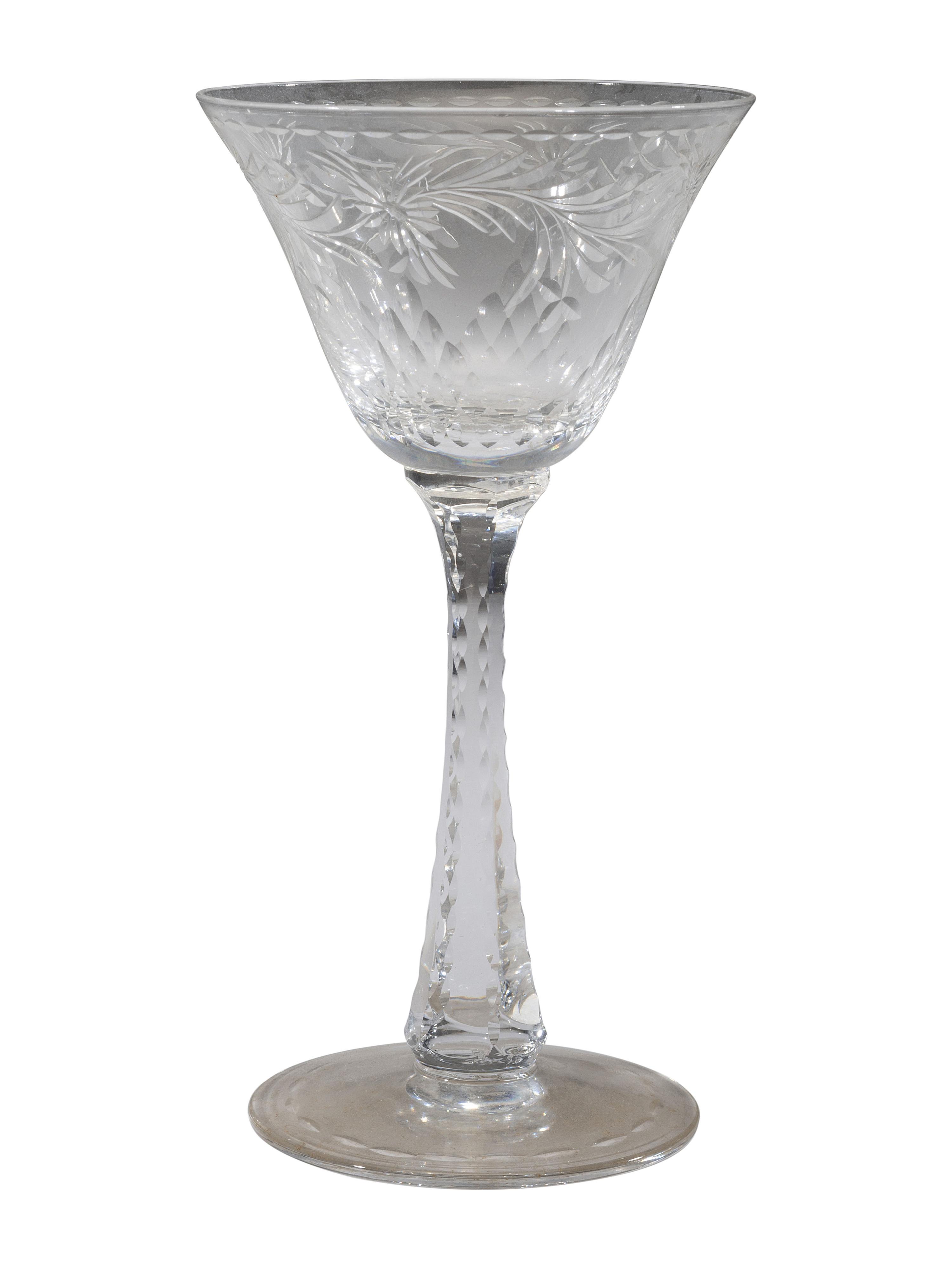 A Collection of Cut Glass Stemware and Plates