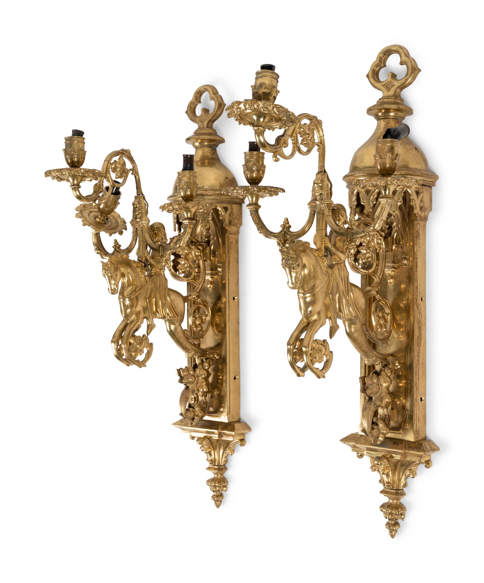 A Pair of Gothic Style Brass Three-Light Sconces