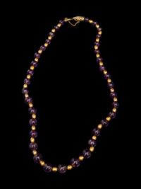 A Necklace of Amethyst and Gold Beads
