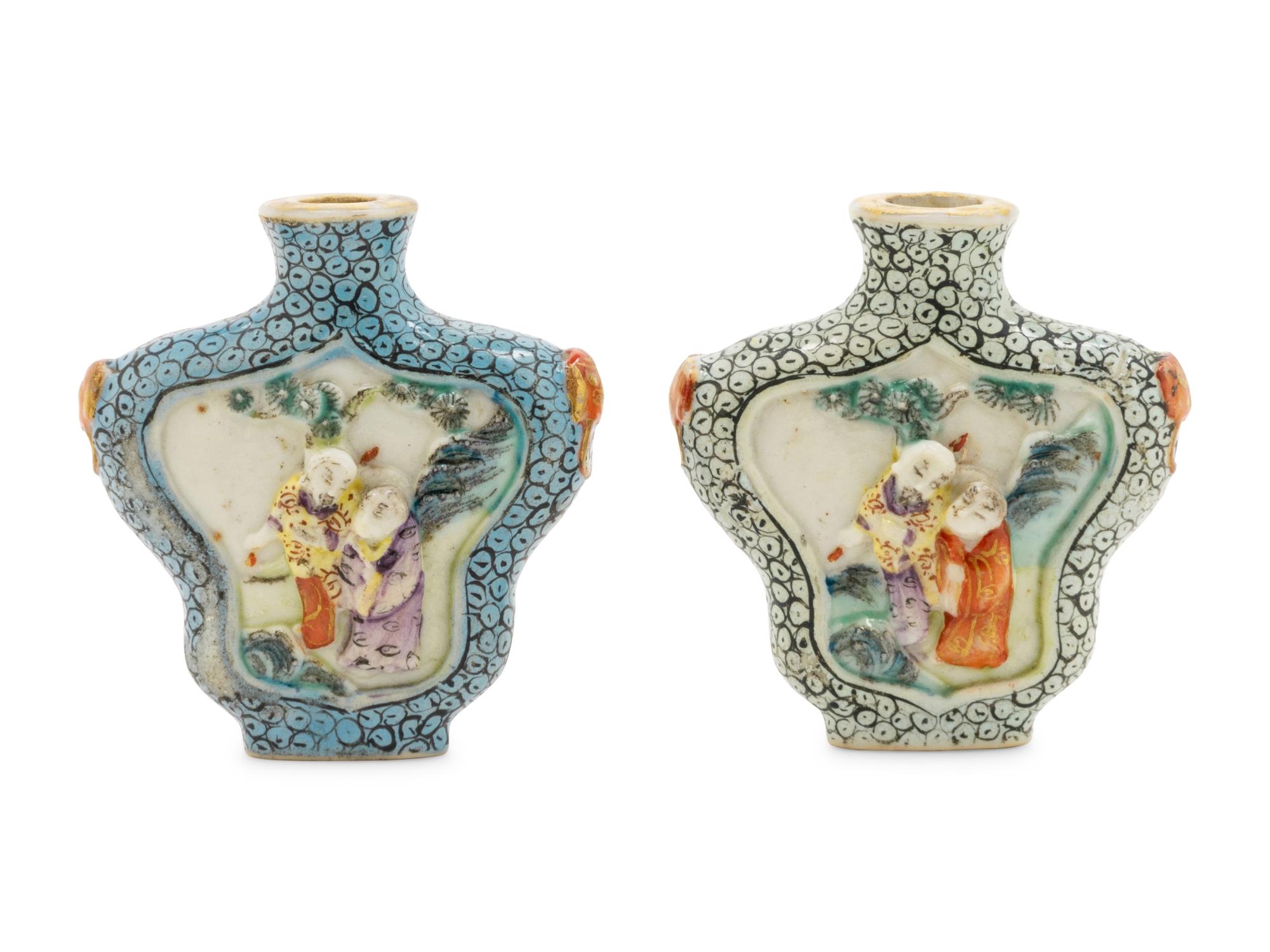 Two Molded Famille Rose Porcelain Snuff Bottles