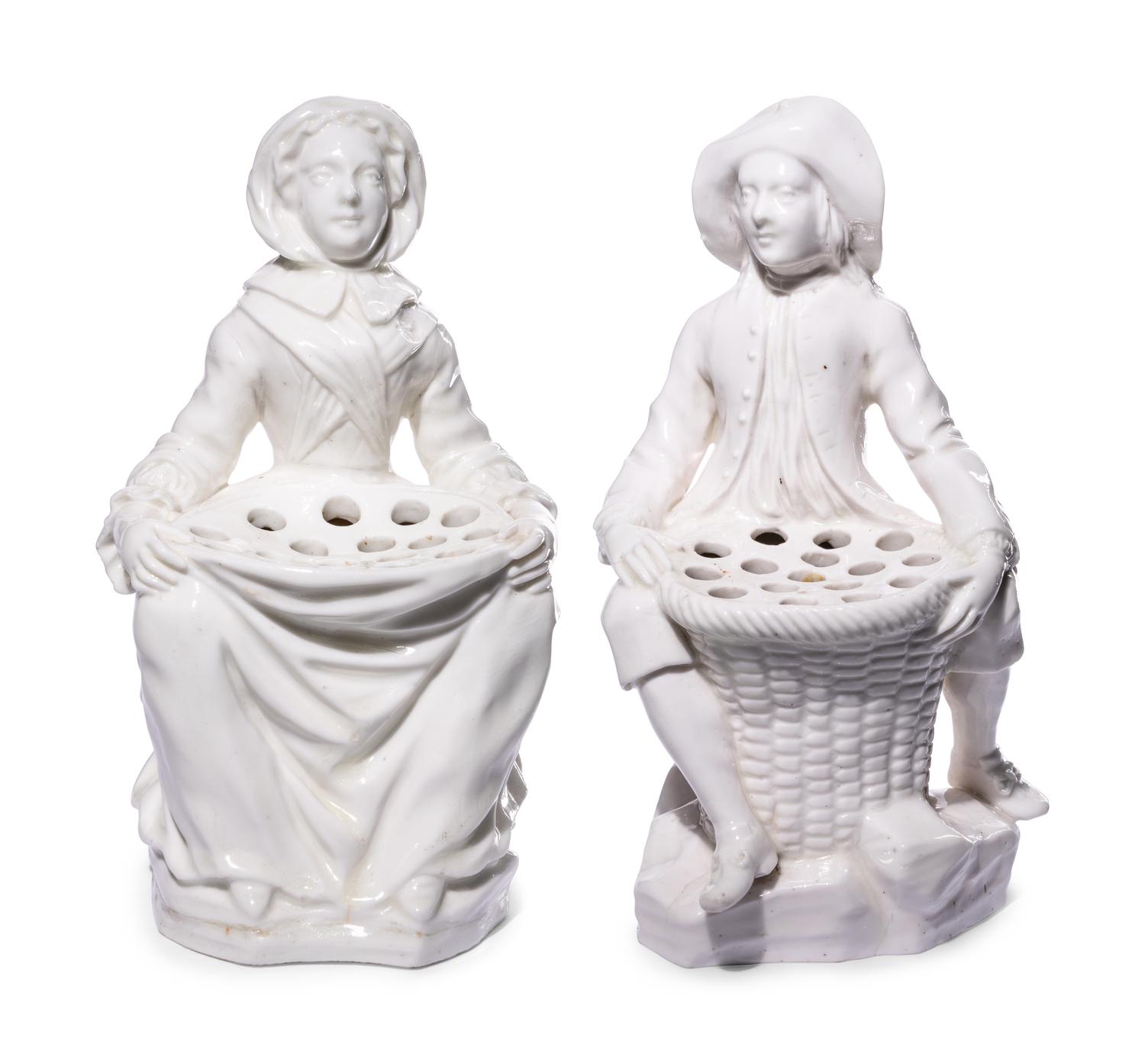 A Pair of French Soft-Paste Porcelain White Bouquetière Figures