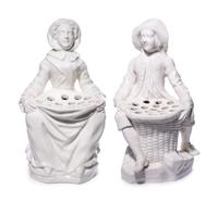 A Pair of French Soft-Paste Porcelain White Bouquetière Figures