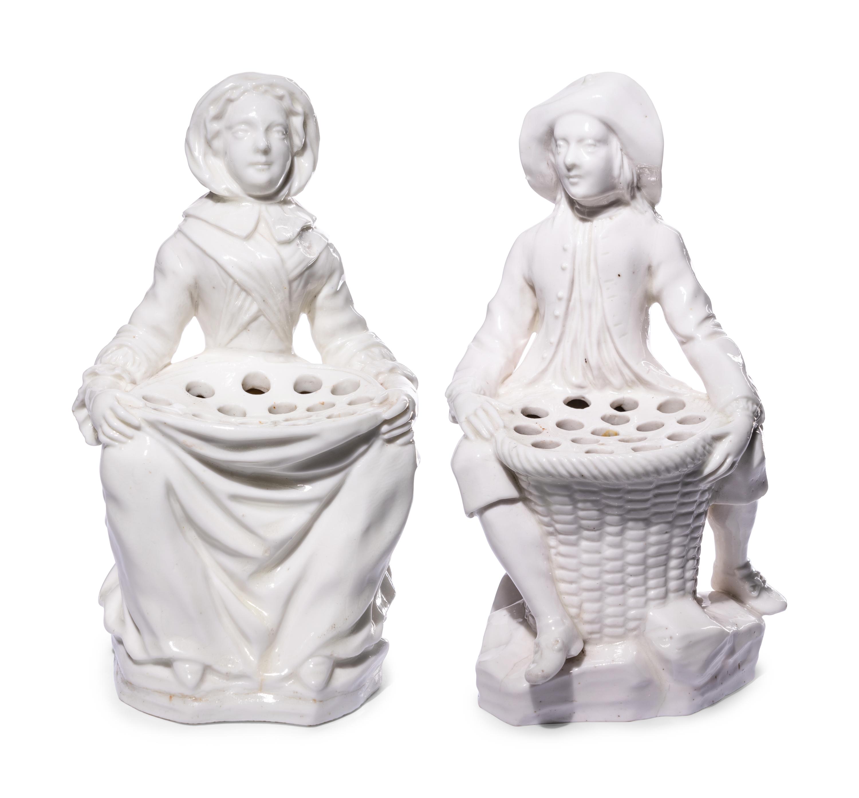 A Pair of French Soft-Paste Porcelain White Bouquetière Figures
