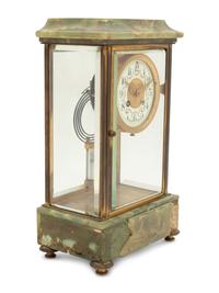A French Parcel Gilt Bronze and Onyx Clock