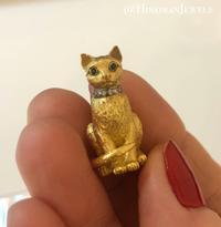 TIFFANY & CO., YELLOW GOLD AND DIAMOND CAT BROOCH