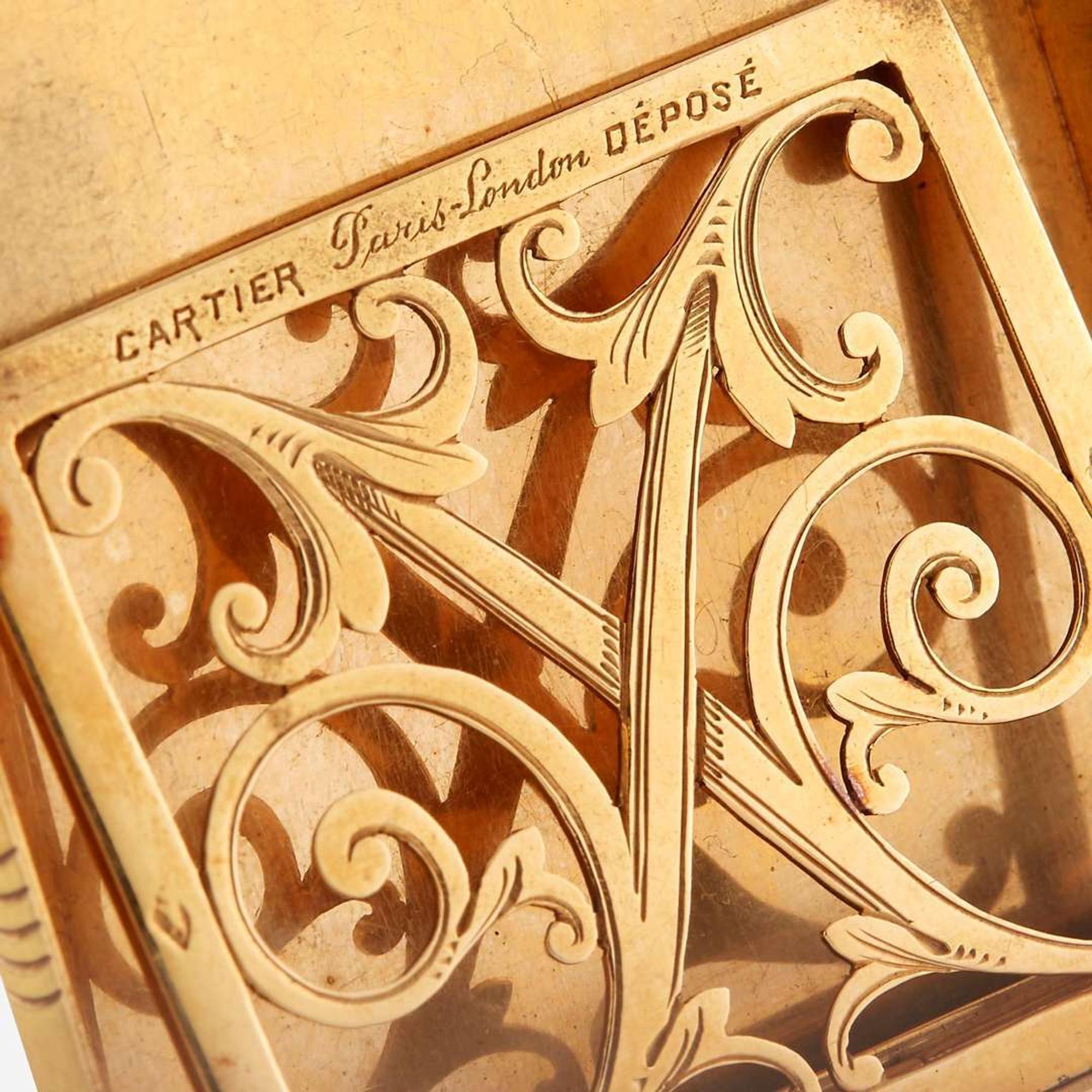 An eighteen karat gold and sapphire card case, Cartier