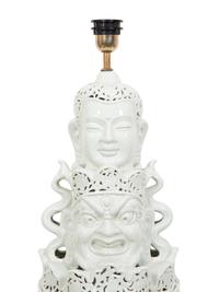 A Contemporary Blanc de Chine Porcelain Table Lamp with Mulit-Face Design