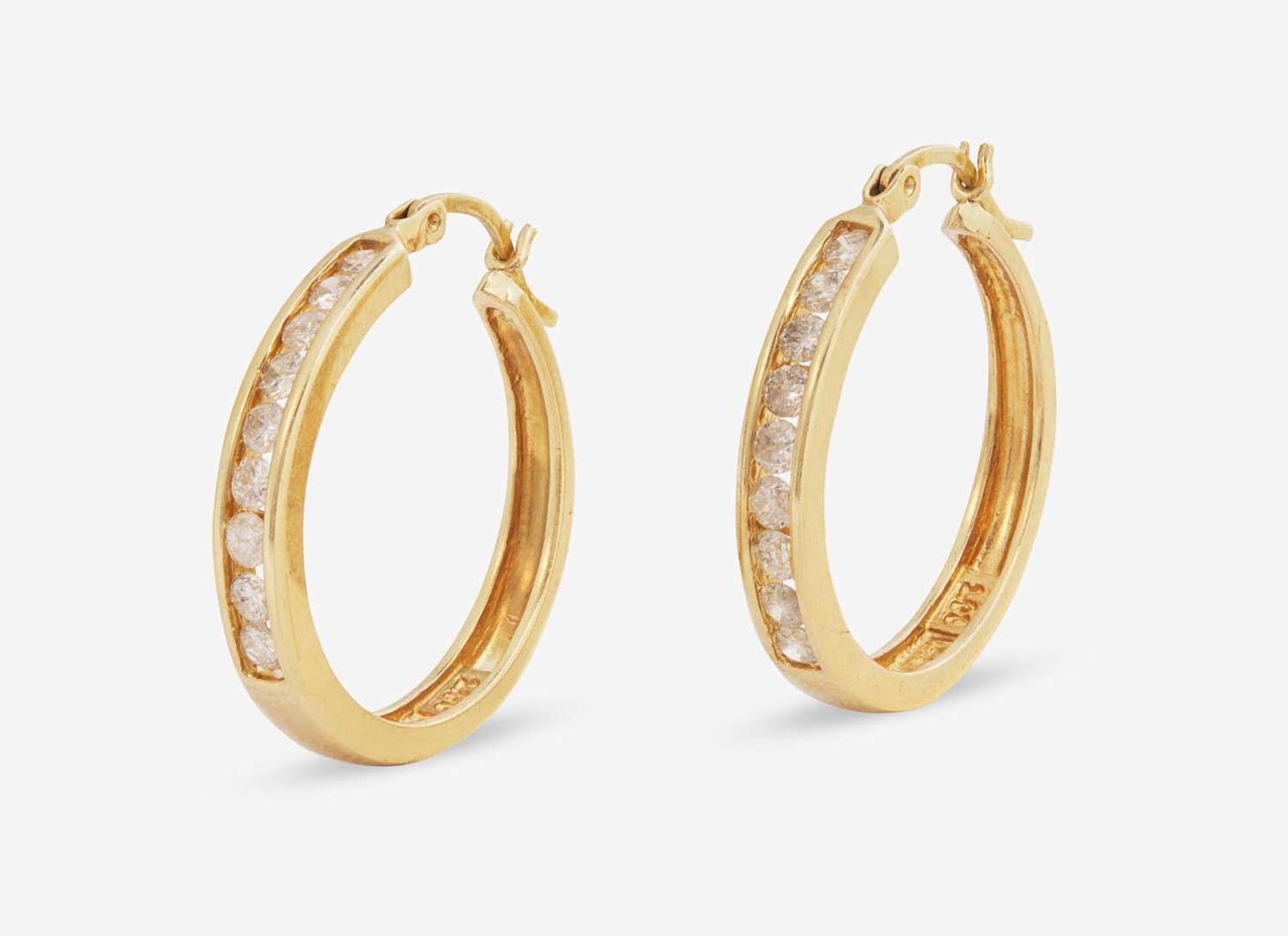 A 14K Yellow Gold and Diamond Necklace and Matching Earrings