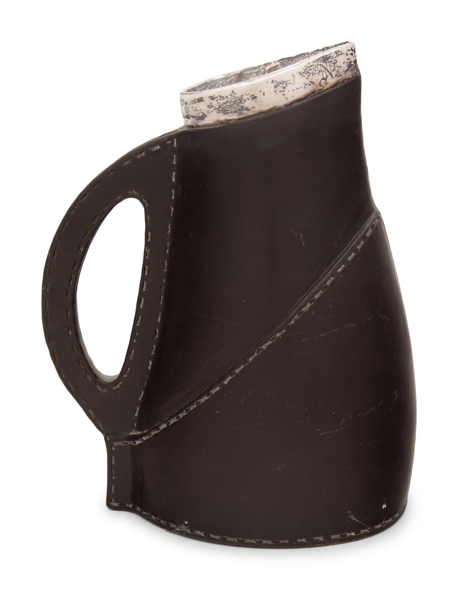 A Doulton Lambeth Silver Mounted Ceramic 'Blackjack' Pitcher