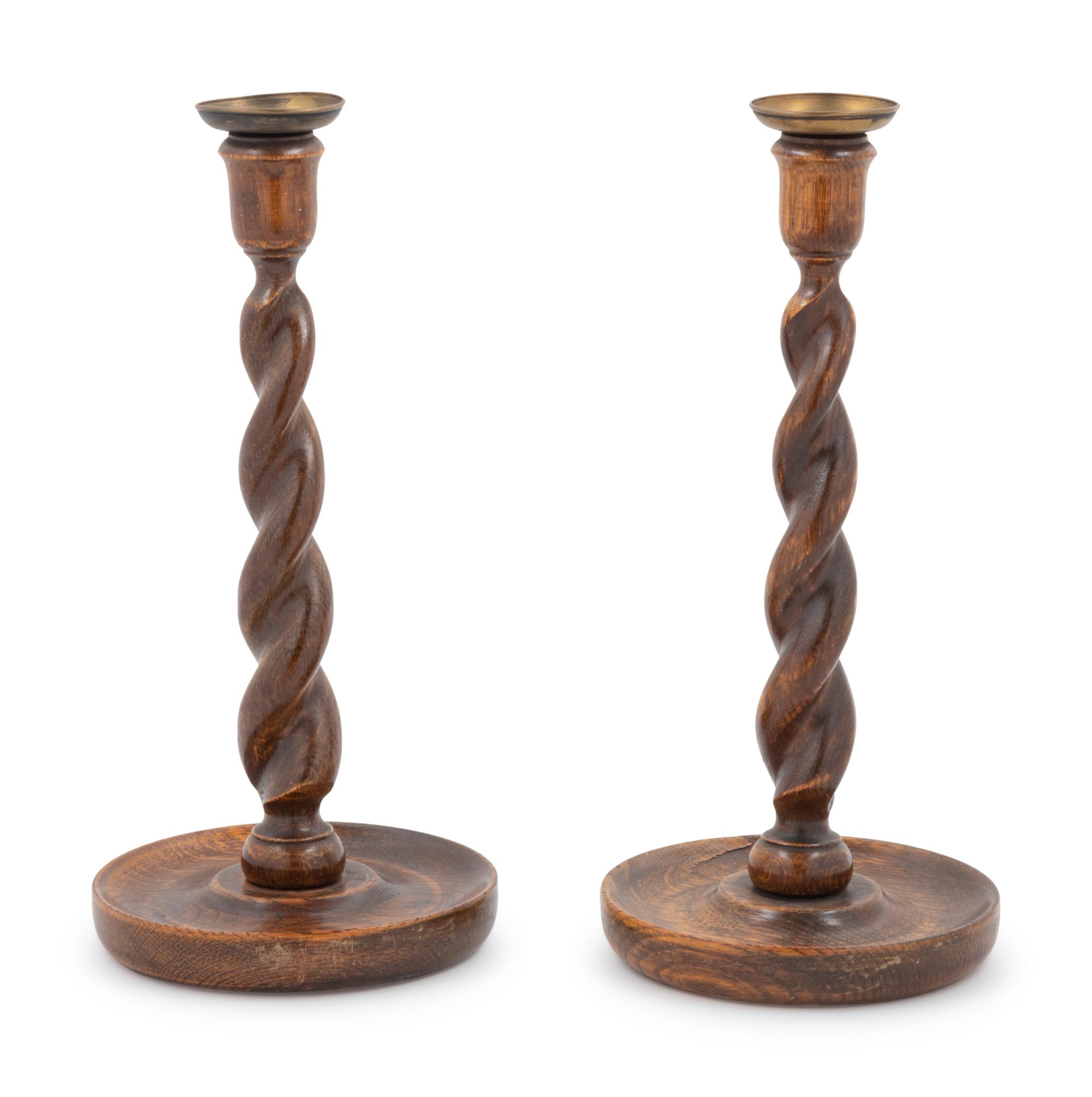 A Pair of Walnut Turned Candlesticks