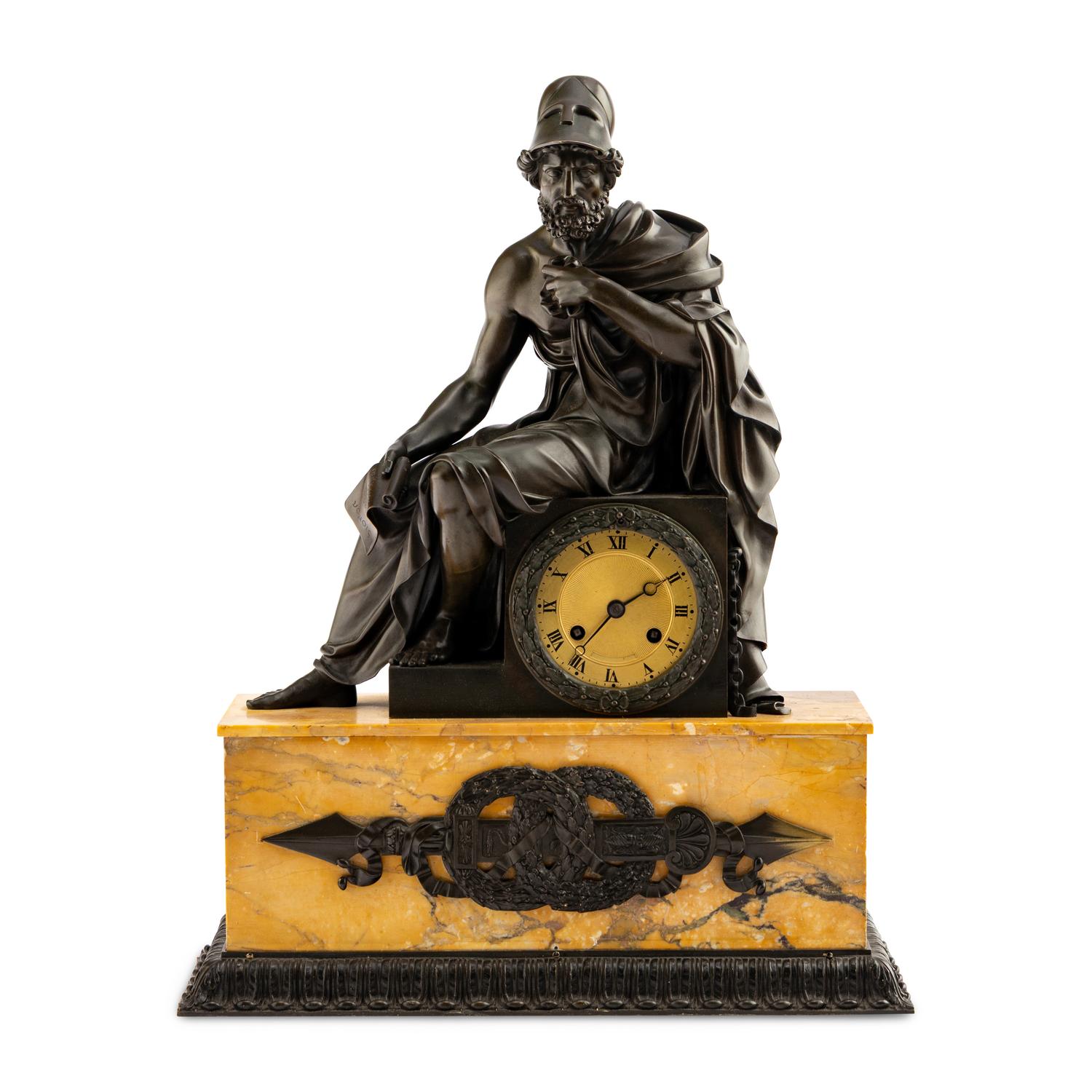 A Louis Philippe Patinated Bronze and Sienna Marble Figural Mantel Clock