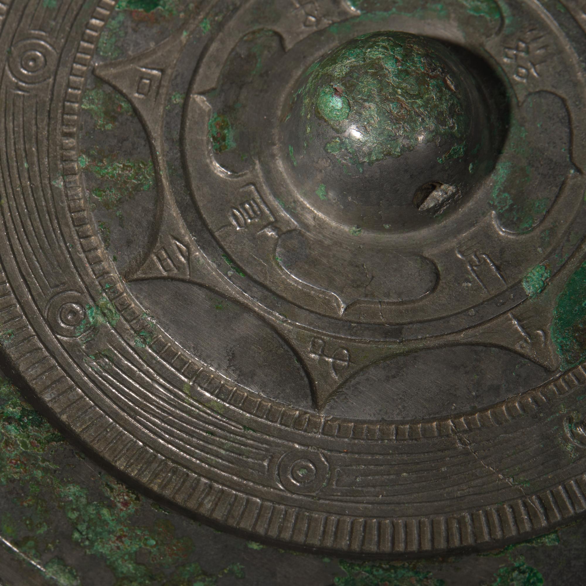 A Chinese Inscribed Bronze Mirror, Han Dynasty 漢 青銅宜子孫鏡