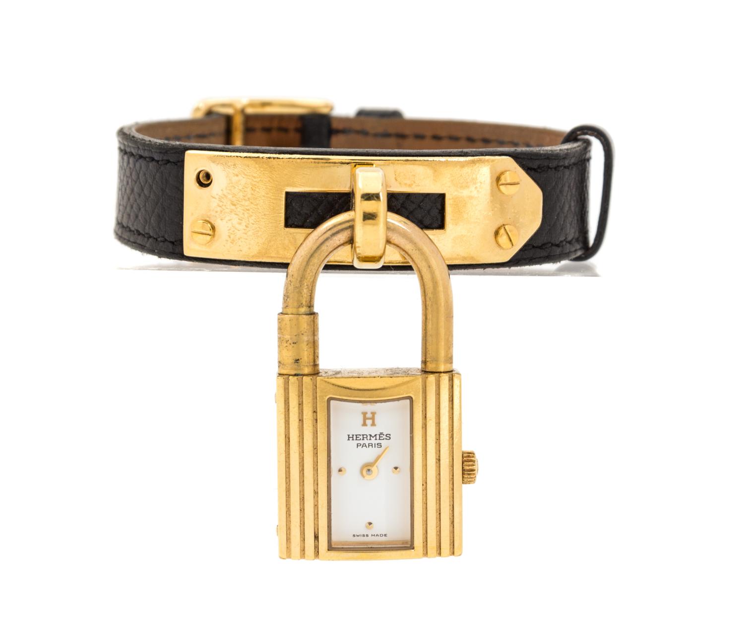 An Hermes Brown Leather Bracelet Watch, 7.5" x .5".