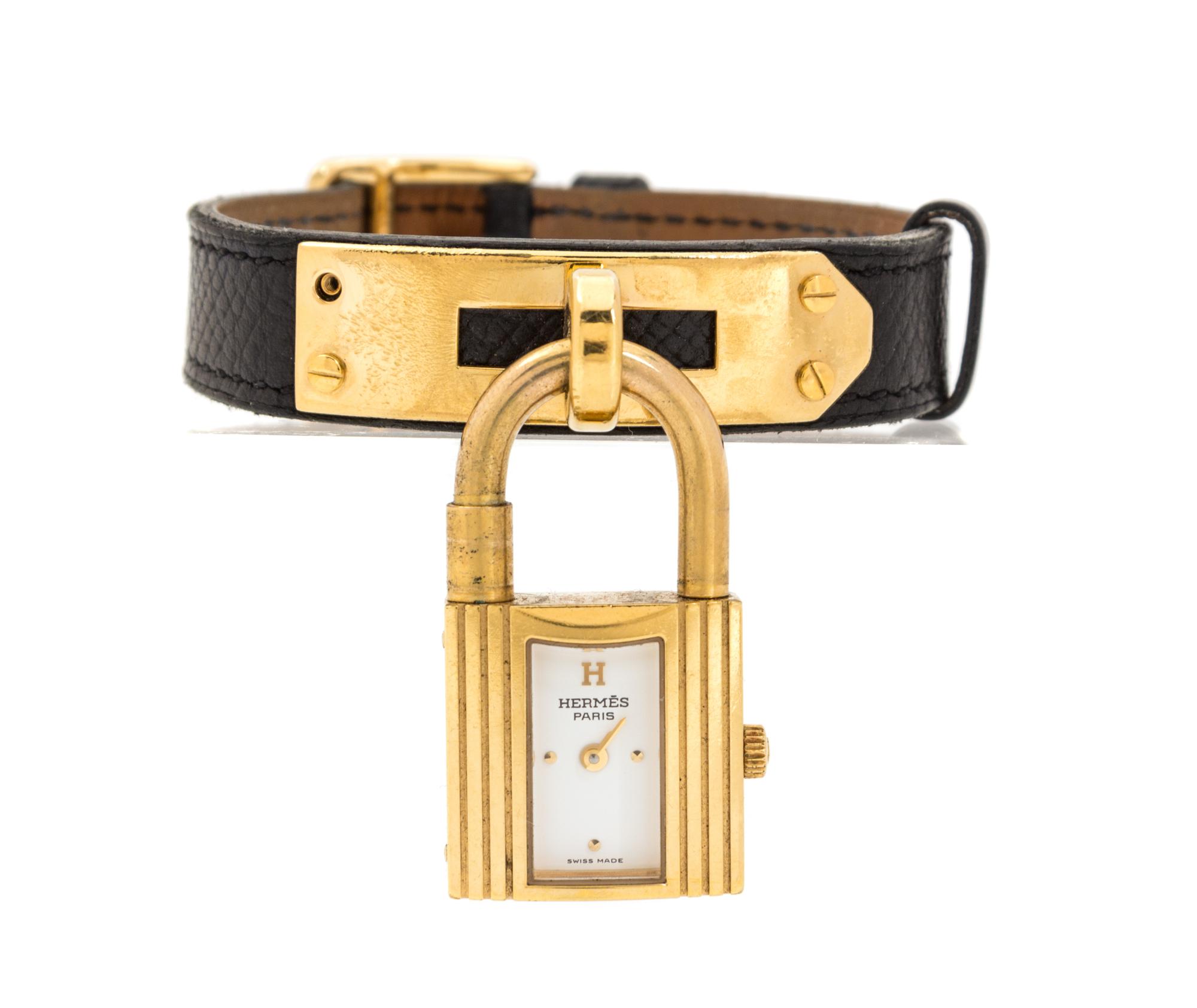 An Hermes Brown Leather Bracelet Watch, 7.5" x .5".