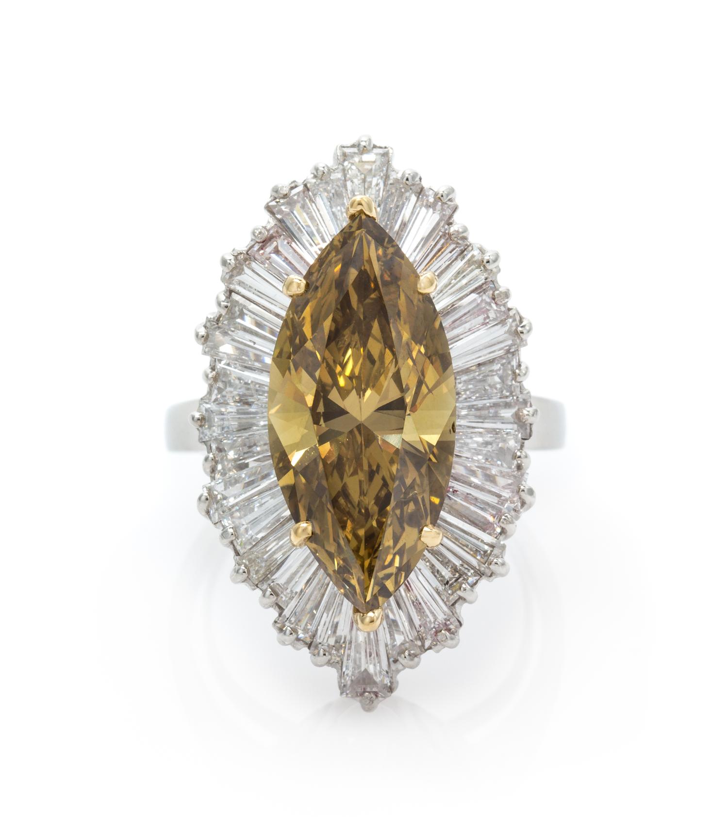 A Platinum, Yellow Gold, Treated Fancy Dark Brown-Yellow Diamond and Diamond Ring, 9.10 dwts.