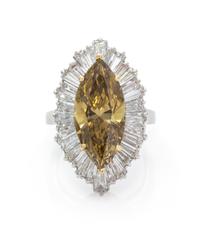 A Platinum, Yellow Gold, Treated Fancy Dark Brown-Yellow Diamond and Diamond Ring, 9.10 dwts.