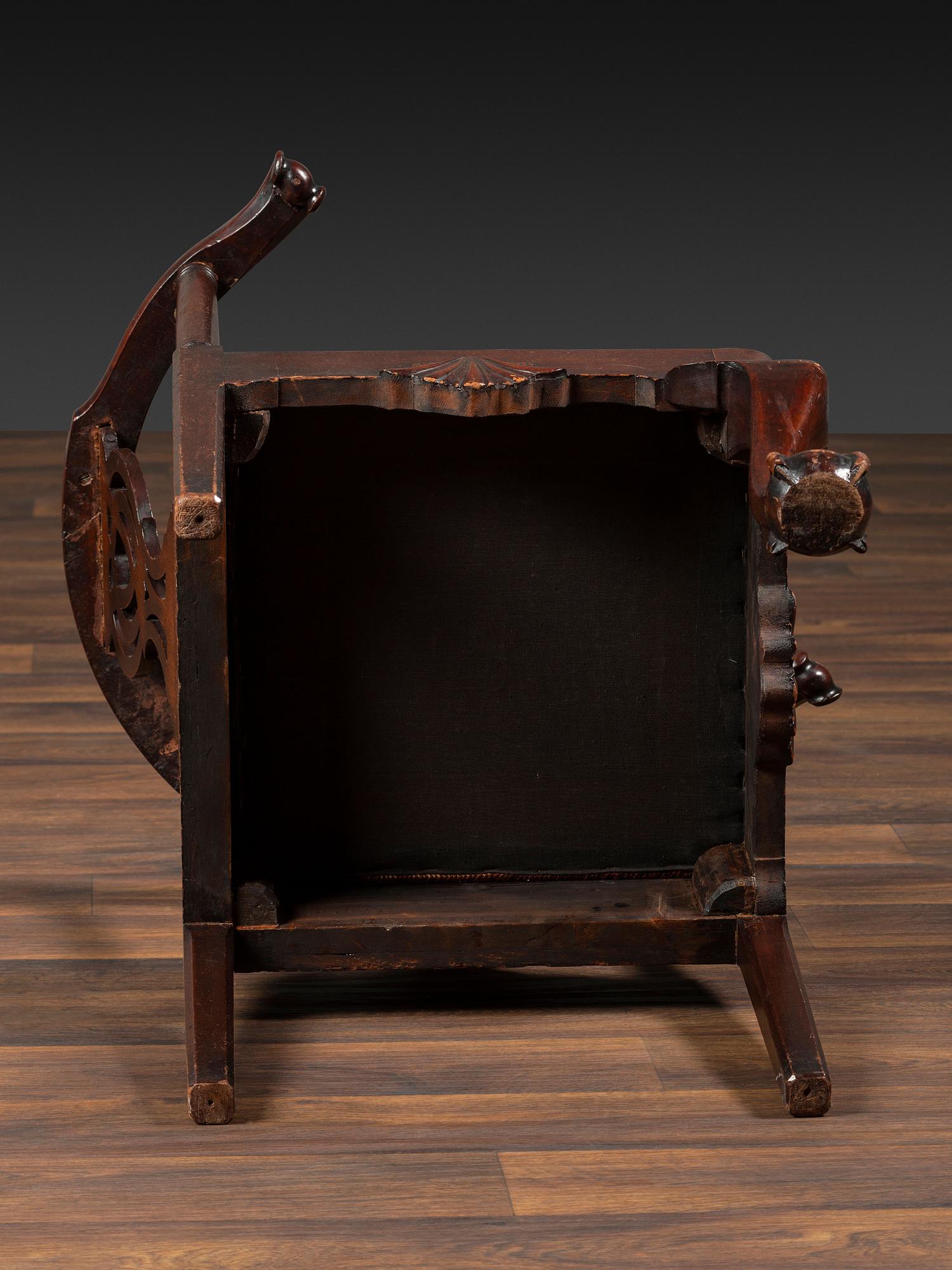 A Chippendale Shell-Carved Mahogany Knuckle-Arm Claw-and-Ball Foot Corner Chair