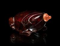 Two Carved Amber Snuff Bottles