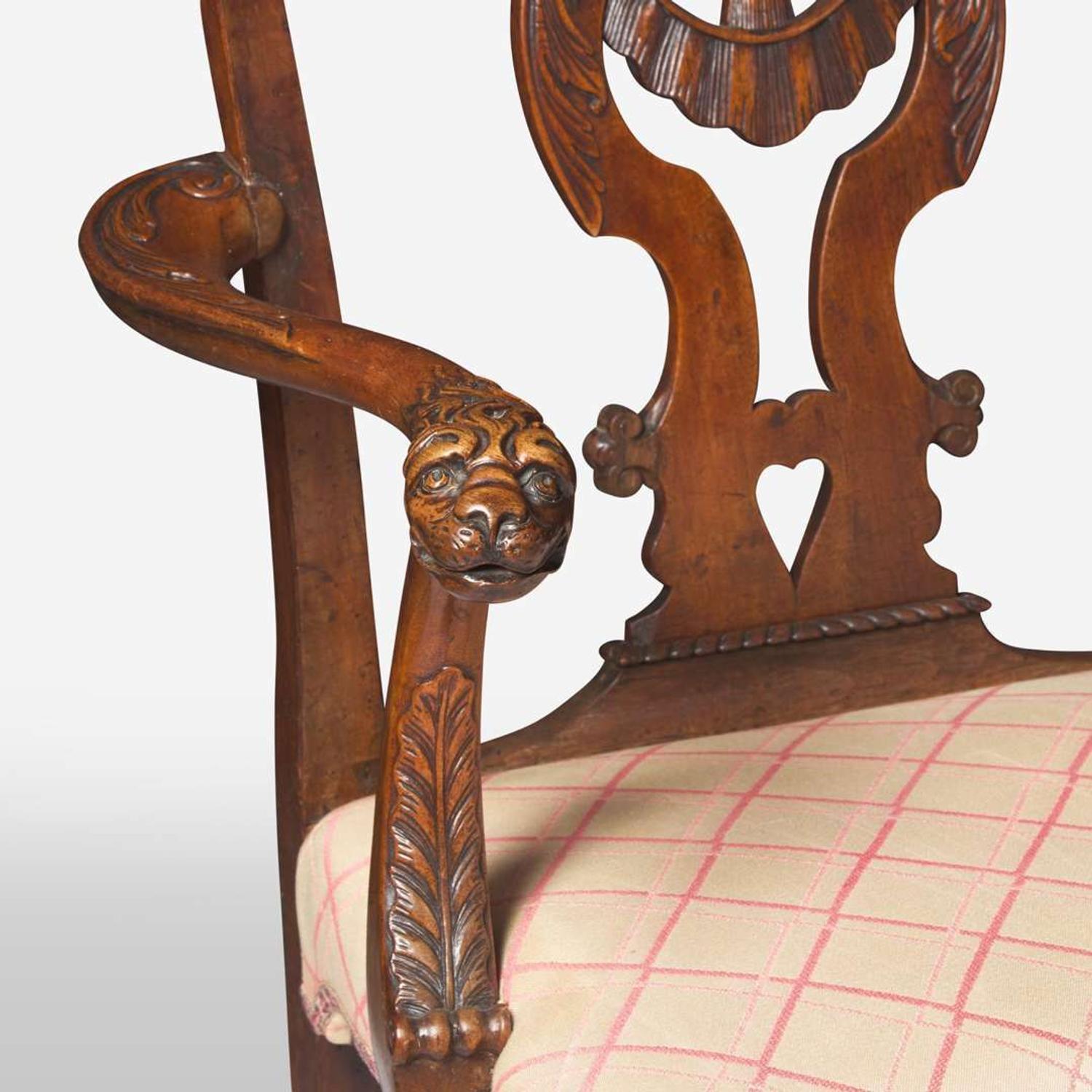 A pair of George II carved walnut armchairs circa 1730