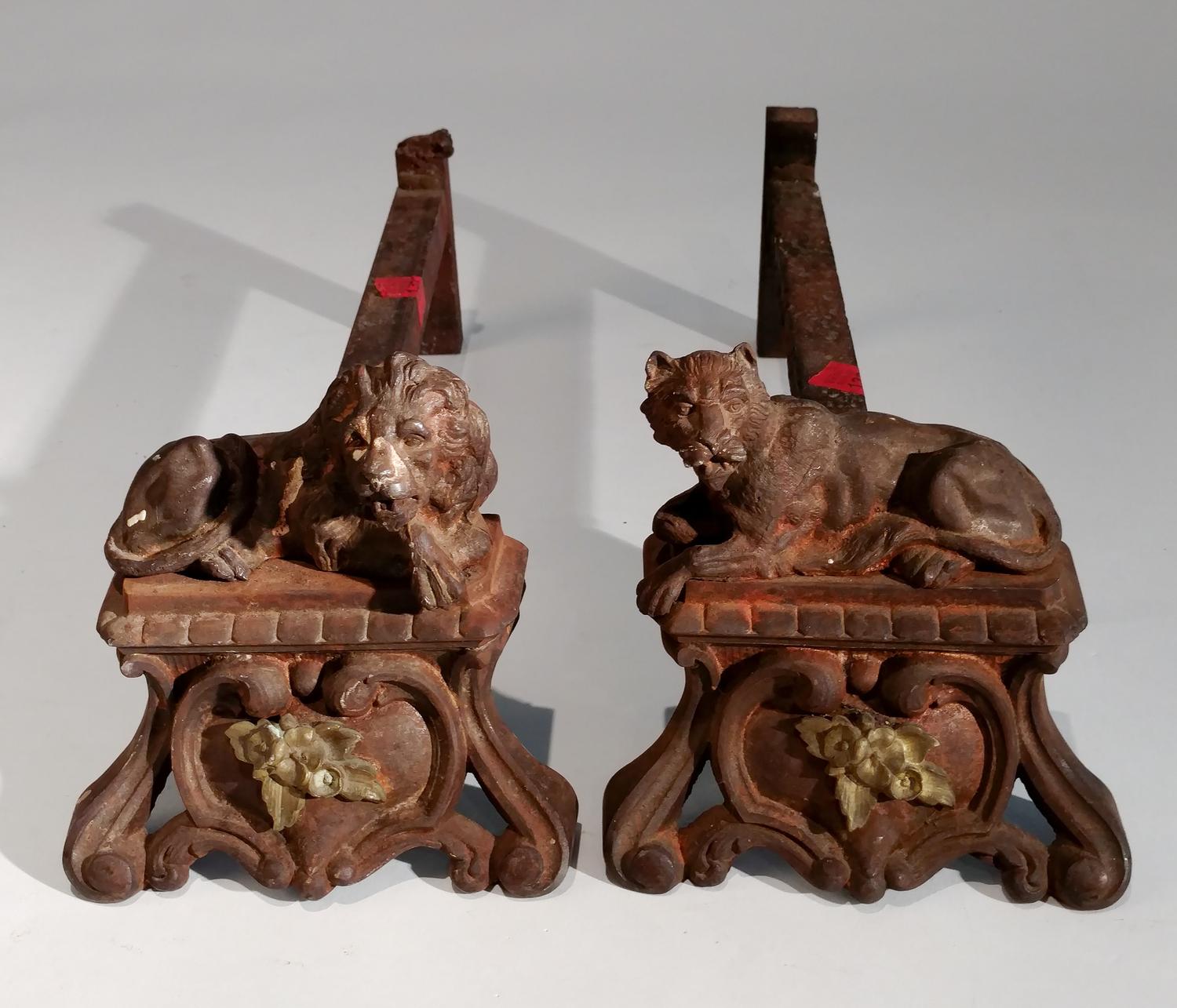 A Pair of Andirons with Lion and Lioness Height 6 inches.