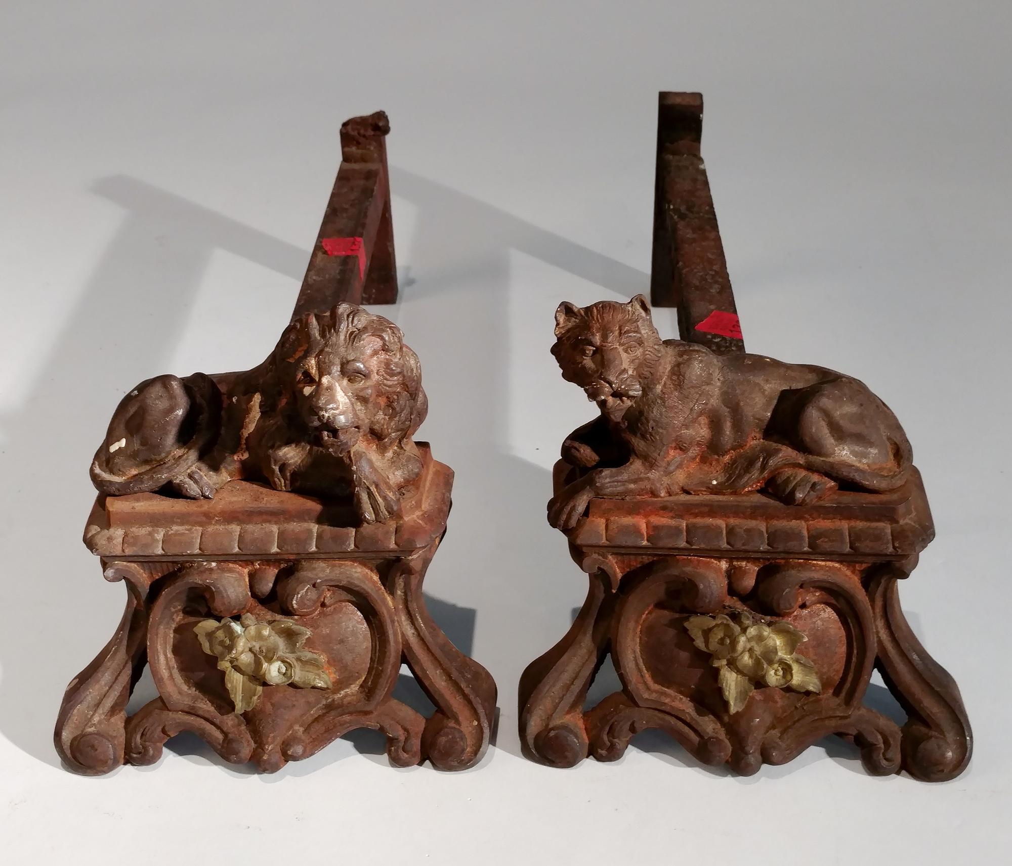 A Pair of Andirons with Lion and Lioness Height 6 inches.