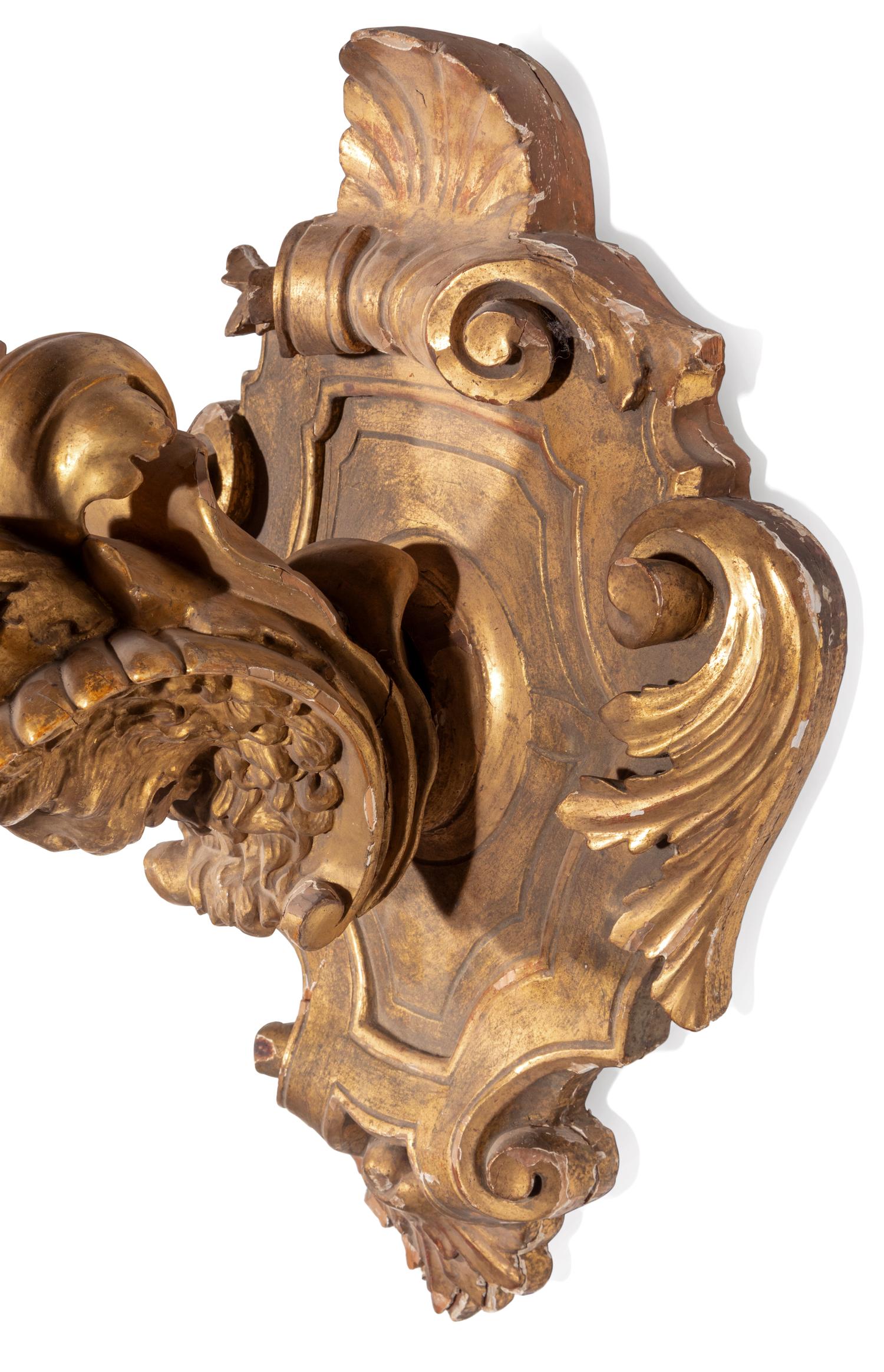 A Pair of Italian Giltwood Figural Wall Brackets
