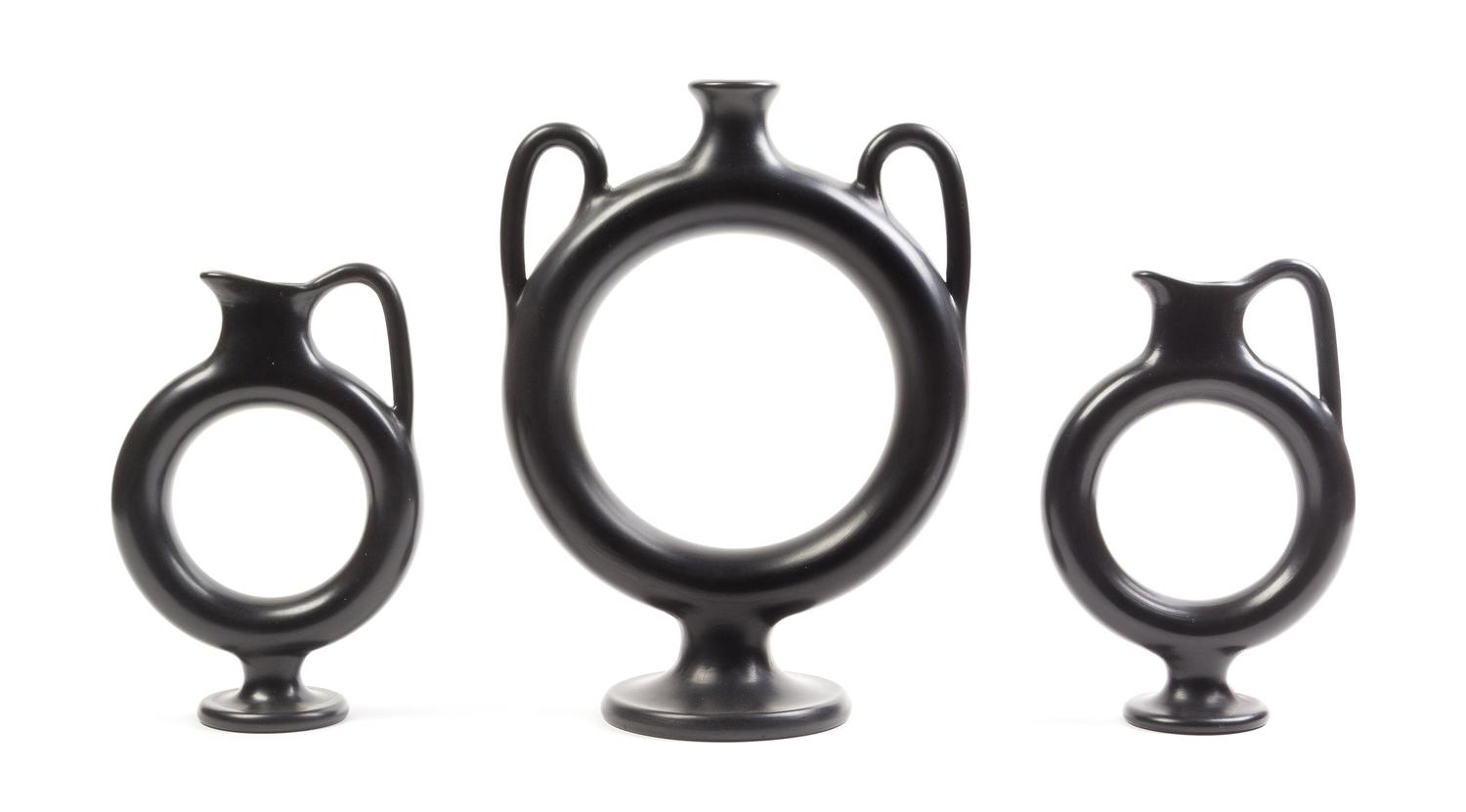 A Group of Three Italian Black-Fired Ewers Height of tallest 12 1/2 inches. — PAOLO GOLIA