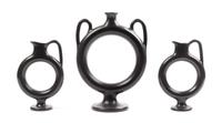 A Group of Three Italian Black-Fired Ewers Height of tallest 12 1/2 inches. — PAOLO GOLIA
