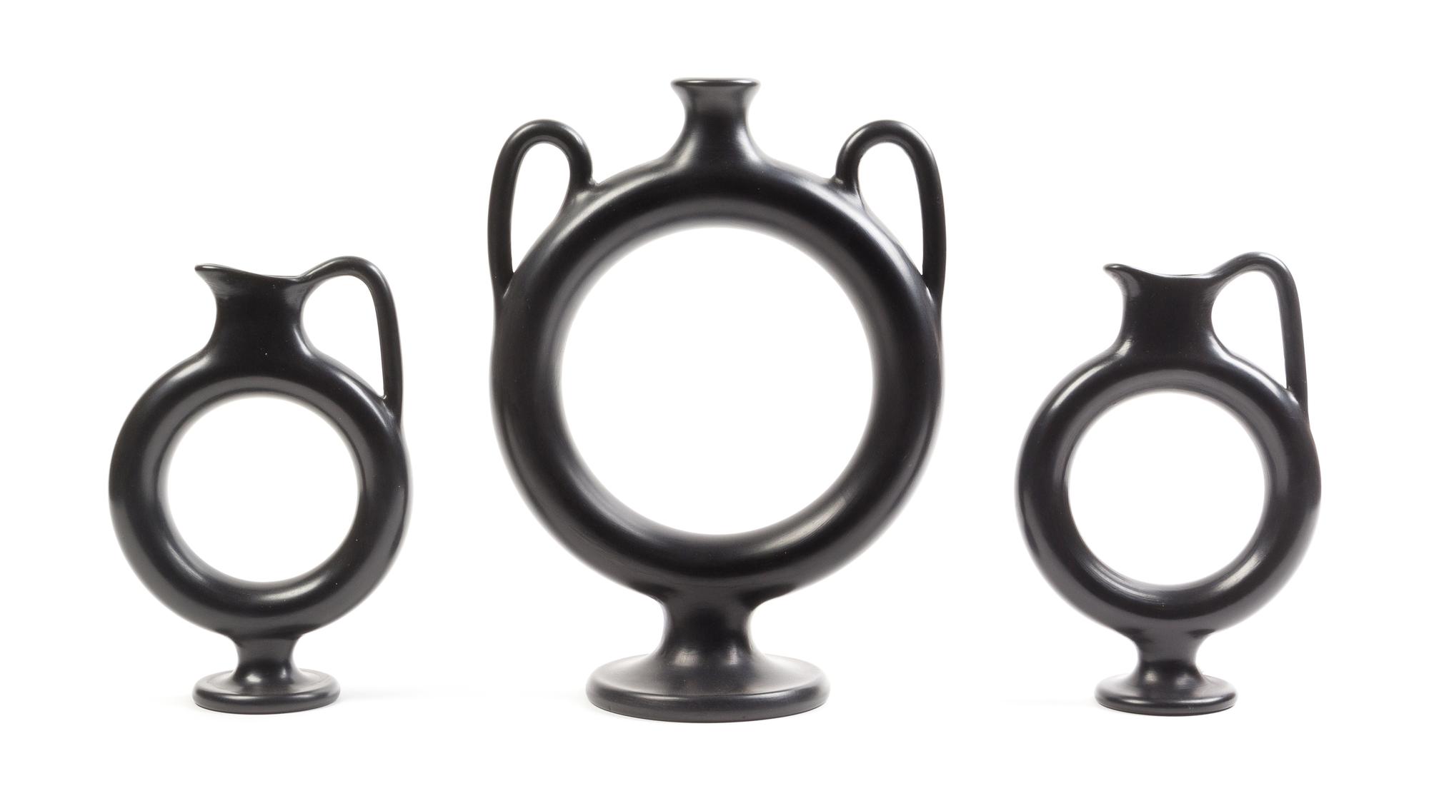 A Group of Three Italian Black-Fired Ewers Height of tallest 12 1/2 inches. — PAOLO GOLIA