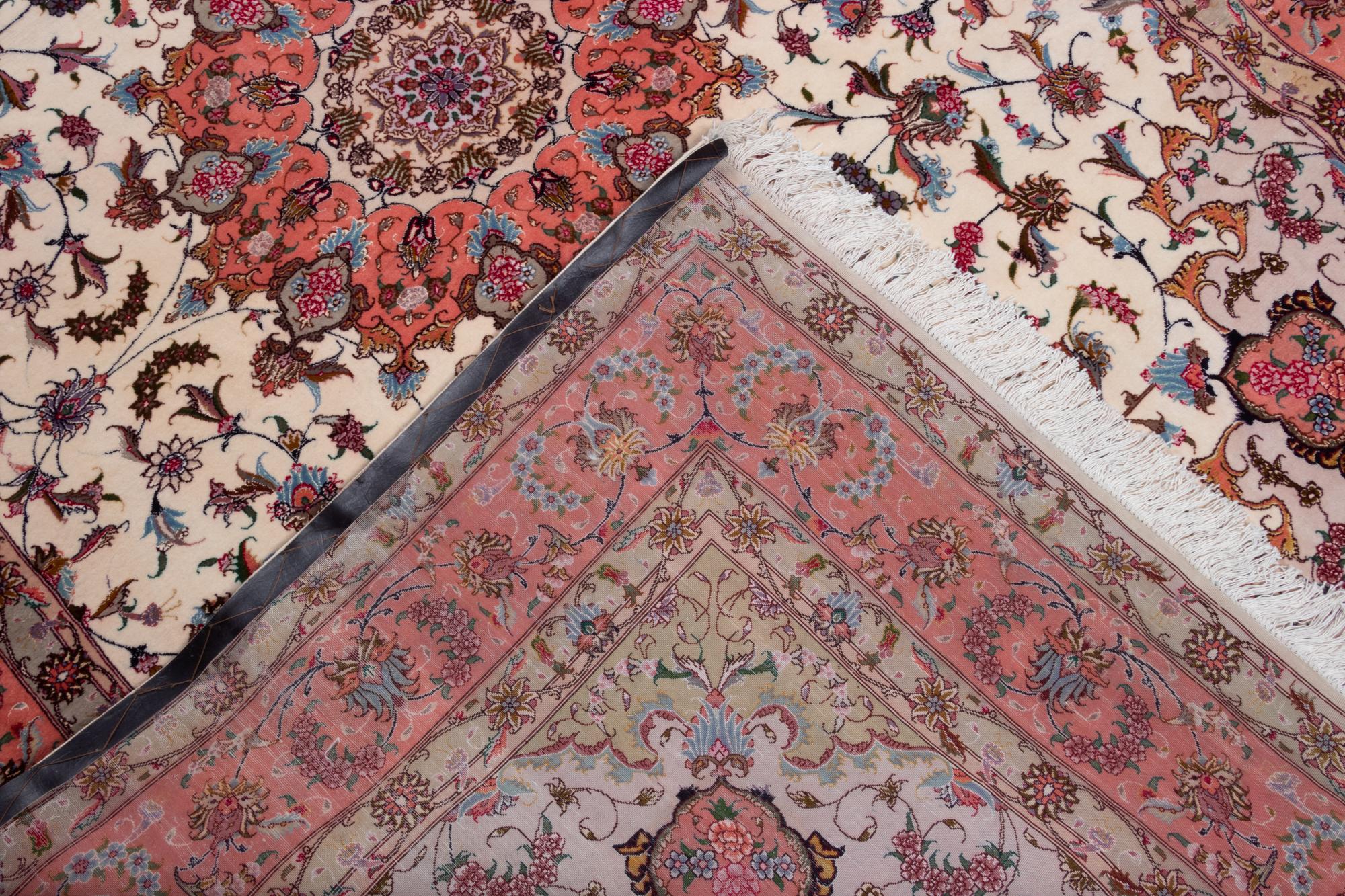 A Tabriz Silk and Wool Rug