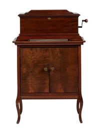A Mira Mahogany-Cased Disc Music Box and Cabinet