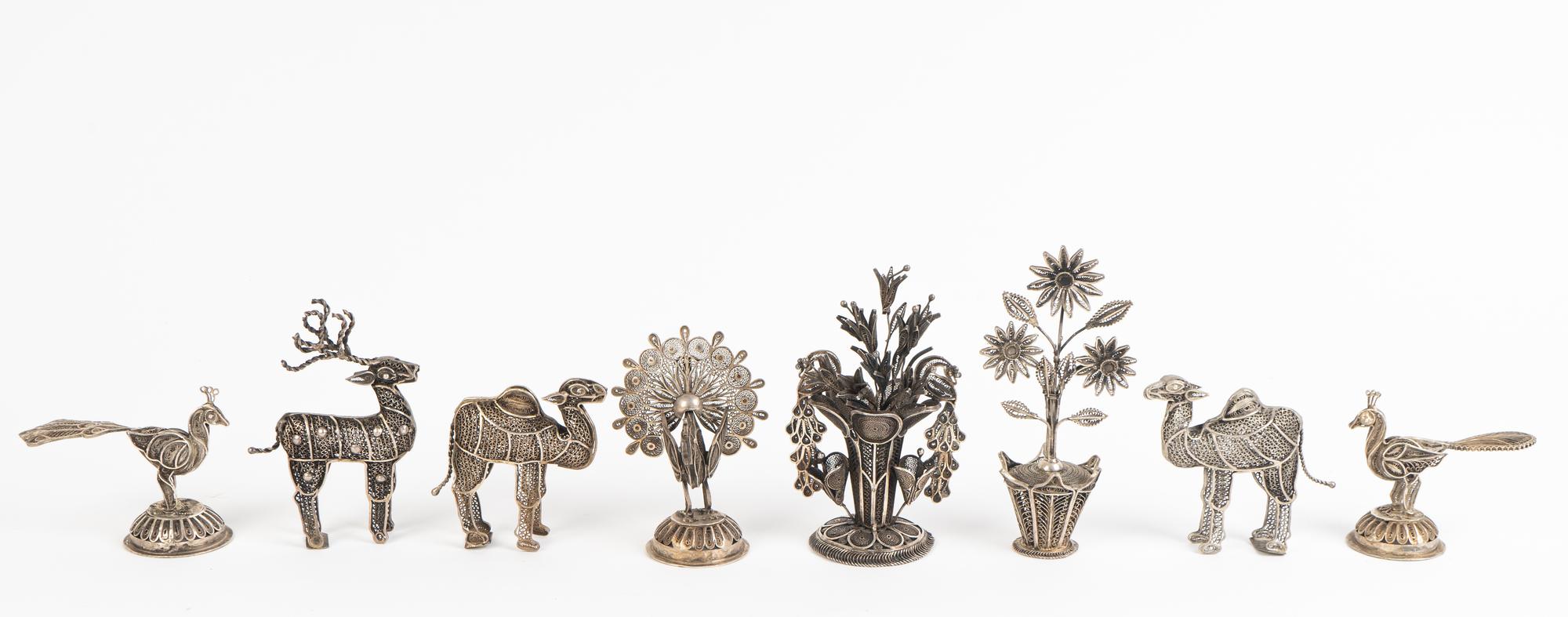 Eight Indian Silvered Filigree Metal Articles
